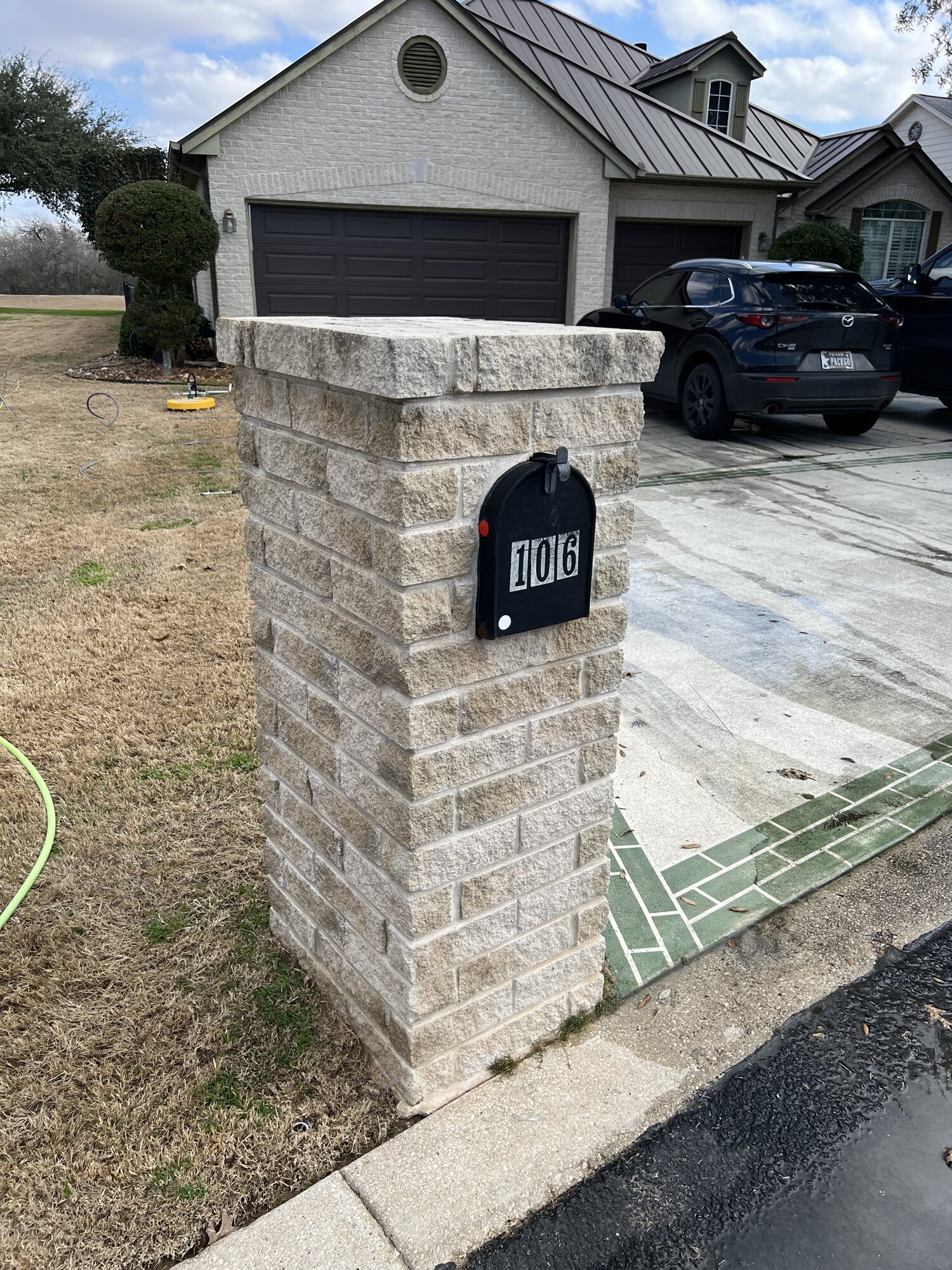 After: Masonry mailbox pillar