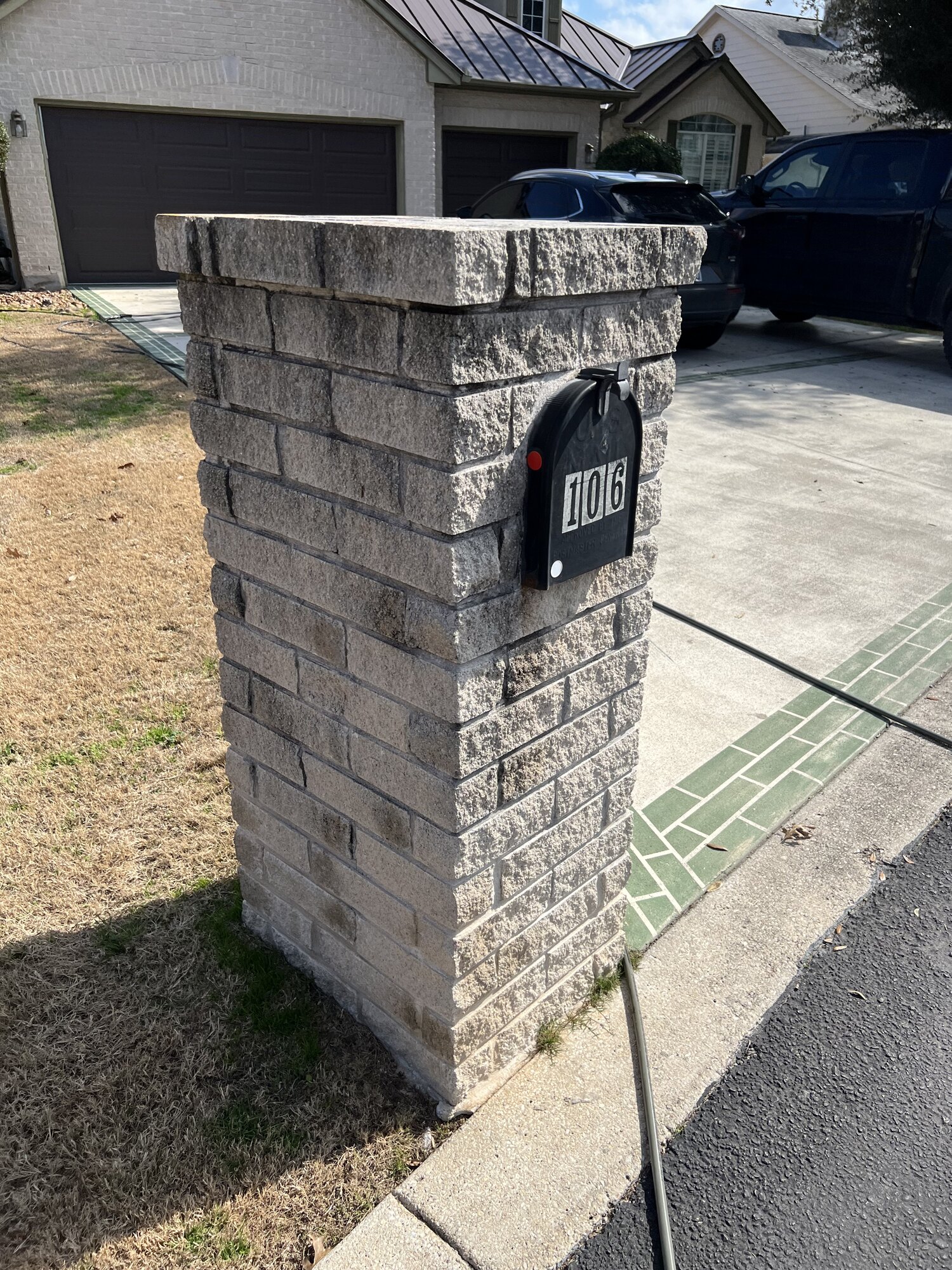Before: Masonry mailbox pillar