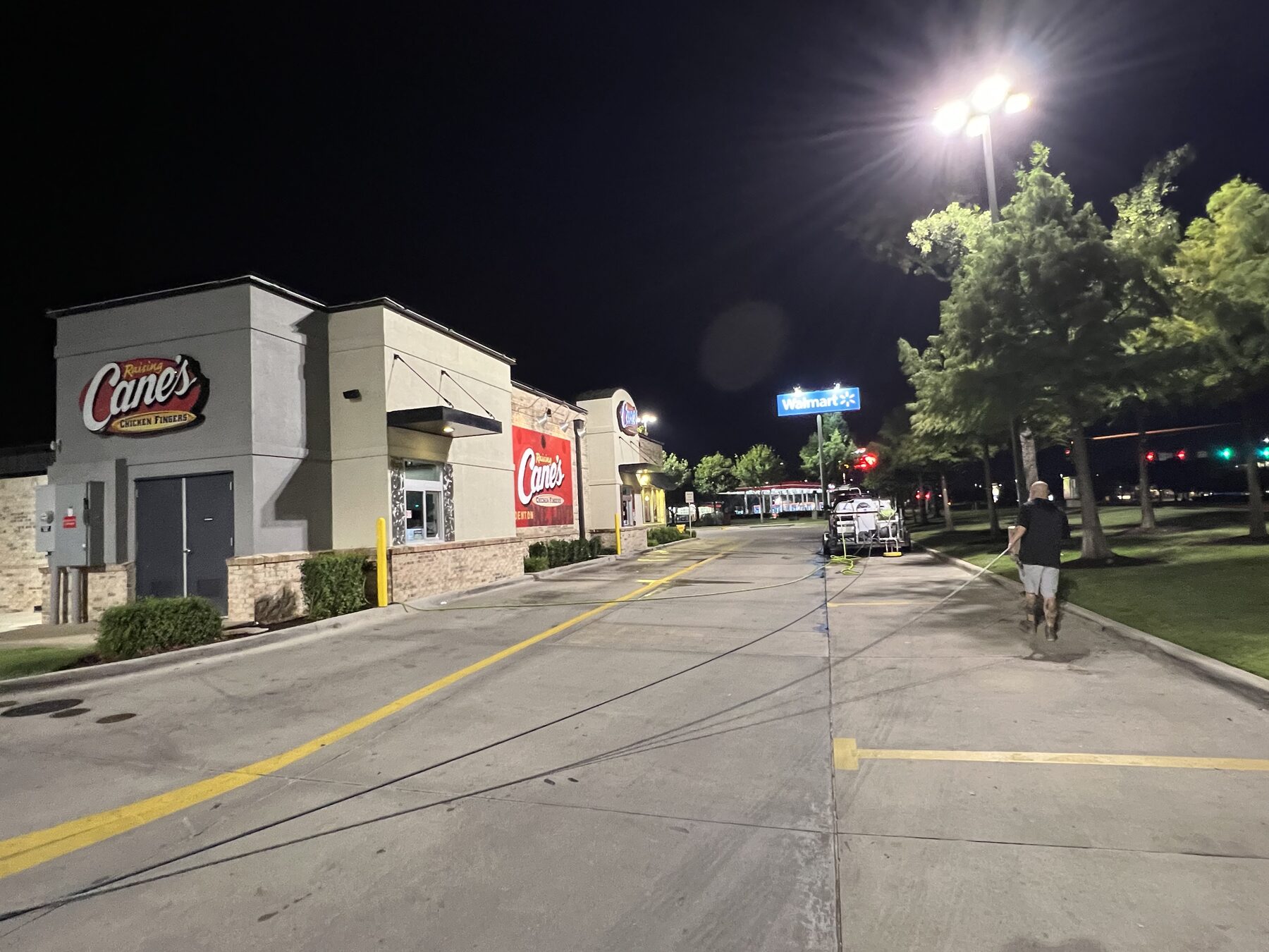 Night commercial service at a Raising Cane's restaurant